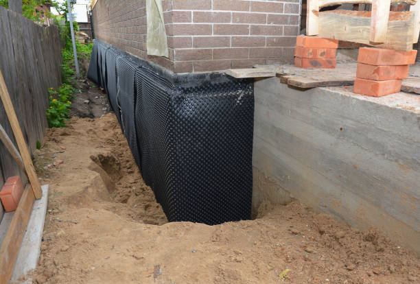 Happy homeowners after waterproofing job in Nunnelly
